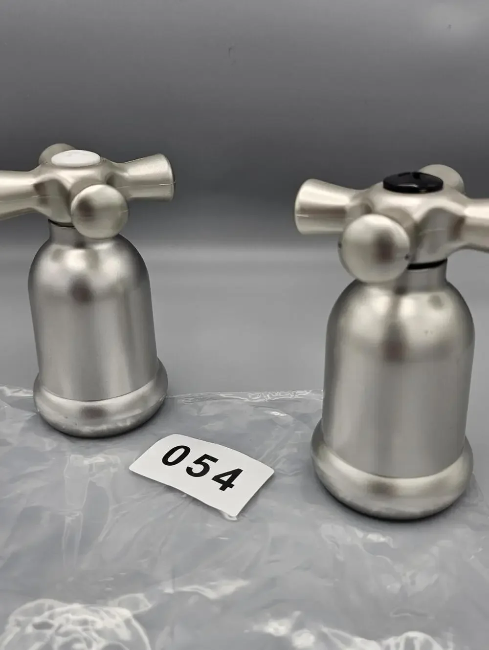 Set of Two Silver salt and pepper shakers with Cross Design